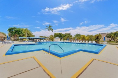 Boasting 1,420 square feet of living space, the condo features a on Sunrise Lakes Phase IV Golf Course in Florida - for sale on GolfHomes.com, golf home, golf lot