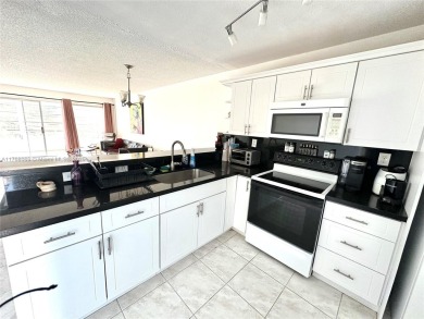 Beautiful, spacious and bright, this 1 1/2  fully furnished on Colony West Country Club in Florida - for sale on GolfHomes.com, golf home, golf lot