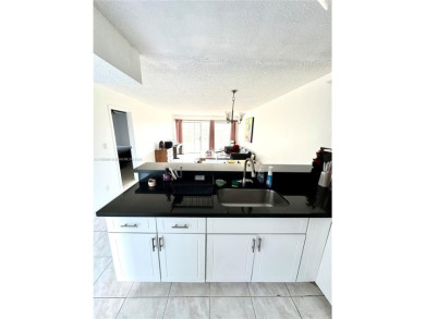 Beautiful, spacious and bright, this 1 1/2  fully furnished on Colony West Country Club in Florida - for sale on GolfHomes.com, golf home, golf lot
