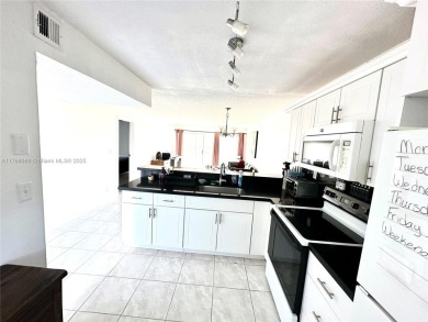 Beautiful, spacious and bright, this 1 1/2  fully furnished on Colony West Country Club in Florida - for sale on GolfHomes.com, golf home, golf lot