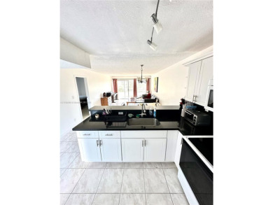 Beautiful, spacious and bright, this 1 1/2  fully furnished on Colony West Country Club in Florida - for sale on GolfHomes.com, golf home, golf lot