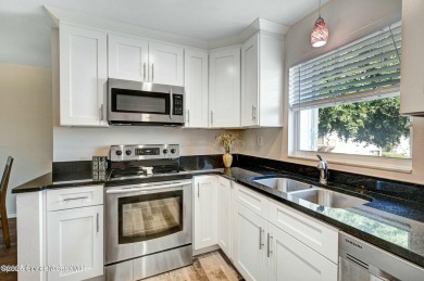 Beautifully maintained UPDATED condo with golf course views. You on Mallards Landing Golf Course in Florida - for sale on GolfHomes.com, golf home, golf lot