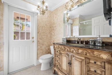 Set in the prestigious Boca Woods Country Club, this on  in Florida - for sale on GolfHomes.com, golf home, golf lot