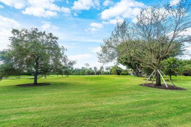 Set in the prestigious Boca Woods Country Club, this on  in Florida - for sale on GolfHomes.com, golf home, golf lot