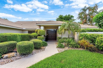 Set in the prestigious Boca Woods Country Club, this on  in Florida - for sale on GolfHomes.com, golf home, golf lot