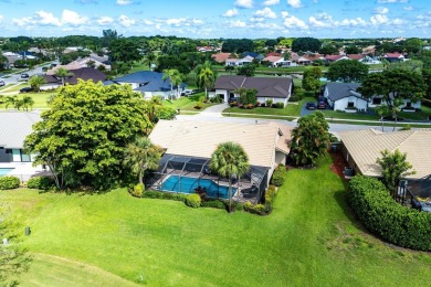 Set in the prestigious Boca Woods Country Club, this on  in Florida - for sale on GolfHomes.com, golf home, golf lot