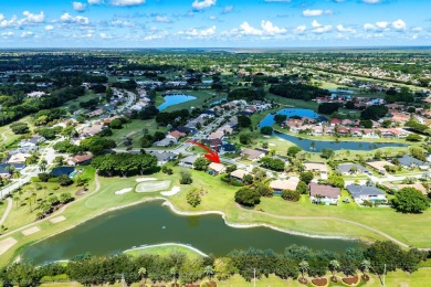Set in the prestigious Boca Woods Country Club, this on  in Florida - for sale on GolfHomes.com, golf home, golf lot