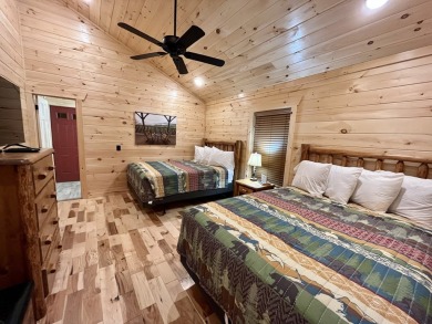 PRICED TO SELL! This custom cabin has 2 beds and 2 baths and is on Bent Creek Golf Course in Tennessee - for sale on GolfHomes.com, golf home, golf lot
