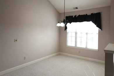 Expansive golf course view from the back yard of this home on Burning Ridge Golf Course in South Carolina - for sale on GolfHomes.com, golf home, golf lot