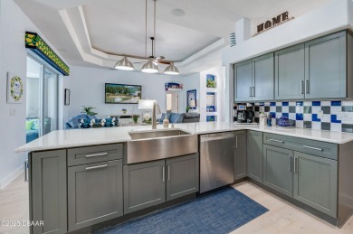 WOW! Look at that AMAZING outdoor living space with a stunning on LPGA International Golf Course in Florida - for sale on GolfHomes.com, golf home, golf lot
