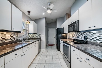 This Dartmouth model condo is centrally located with quick on Scepter Golf Club in Florida - for sale on GolfHomes.com, golf home, golf lot
