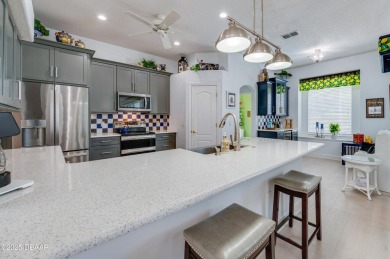 WOW! Look at that AMAZING outdoor living space with a stunning on LPGA International Golf Course in Florida - for sale on GolfHomes.com, golf home, golf lot