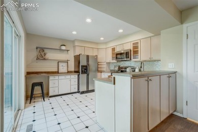 This townhome is ideally located in a quiet neighborhood backing on Country Club of Colorado in Colorado - for sale on GolfHomes.com, golf home, golf lot