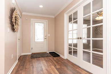 Welcome to this desirable single-level ranch in Fairways of on Whispering Pines Golf  in Michigan - for sale on GolfHomes.com, golf home, golf lot