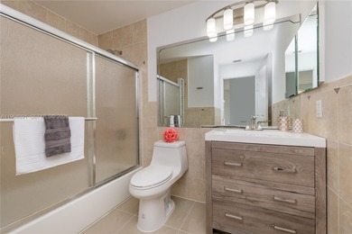 Experience the ultimate Doral lifestyle in this stunning 5BR/3BA on Jim McLean Signature Course in Florida - for sale on GolfHomes.com, golf home, golf lot