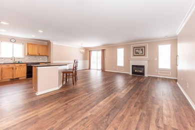 Welcome to this desirable single-level ranch in Fairways of on Whispering Pines Golf  in Michigan - for sale on GolfHomes.com, golf home, golf lot