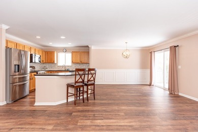 Welcome to this desirable single-level ranch in Fairways of on Whispering Pines Golf  in Michigan - for sale on GolfHomes.com, golf home, golf lot