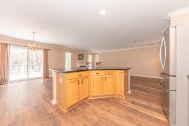 Welcome to this desirable single-level ranch in Fairways of on Whispering Pines Golf  in Michigan - for sale on GolfHomes.com, golf home, golf lot