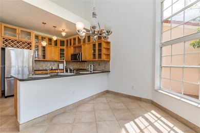 Experience the ultimate Doral lifestyle in this stunning 5BR/3BA on Jim McLean Signature Course in Florida - for sale on GolfHomes.com, golf home, golf lot