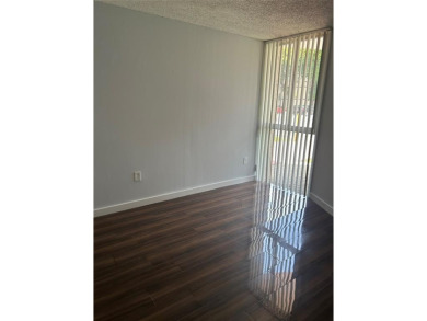 *OWNER  MOTIVATED*   2 bedroom  2 bath condo  unit located on on Country Club of Miami in Florida - for sale on GolfHomes.com, golf home, golf lot