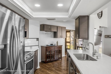 Updated detached villa in a pet friendly village with it's own on Timber Pines Golf Course in Florida - for sale on GolfHomes.com, golf home, golf lot