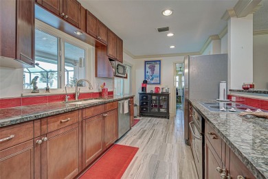 One or more photo(s) has been virtually staged. This home has on Jacaranda West Country Club in Florida - for sale on GolfHomes.com, golf home, golf lot