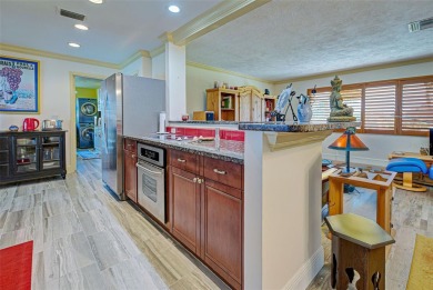 One or more photo(s) has been virtually staged. This home has on Jacaranda West Country Club in Florida - for sale on GolfHomes.com, golf home, golf lot