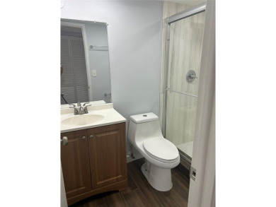 *OWNER  MOTIVATED*   2 bedroom  2 bath condo  unit located on on Country Club of Miami in Florida - for sale on GolfHomes.com, golf home, golf lot