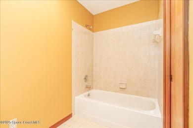 This beautiful half duplex is a lucrative investment opportunity on Suntree Country Club in Florida - for sale on GolfHomes.com, golf home, golf lot