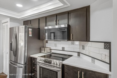 Updated detached villa in a pet friendly village with it's own on Timber Pines Golf Course in Florida - for sale on GolfHomes.com, golf home, golf lot