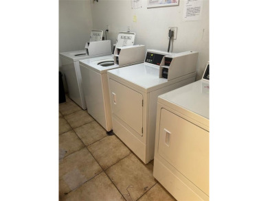 *OWNER  MOTIVATED*   2 bedroom  2 bath condo  unit located on on Country Club of Miami in Florida - for sale on GolfHomes.com, golf home, golf lot