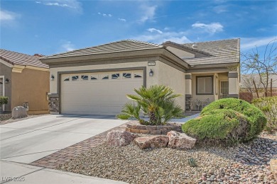 This Charming home is a cozy 2 bed 2 bath home.  Tasteful paint on Aliante Golf Club in Nevada - for sale on GolfHomes.com, golf home, golf lot