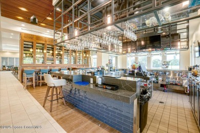 This beautiful half duplex is a lucrative investment opportunity on Suntree Country Club in Florida - for sale on GolfHomes.com, golf home, golf lot