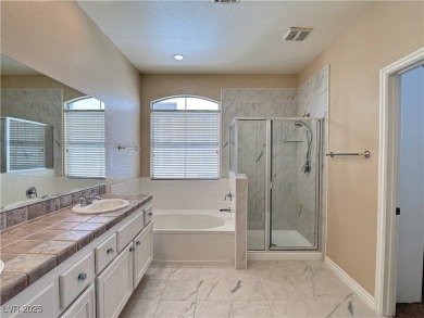 Ideal floorplan in gated Fairway Pointe at Queensridge! Short on Badlands Golf Club in Nevada - for sale on GolfHomes.com, golf home, golf lot