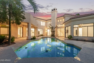Tucked into a quiet cul-de-sac in the exclusive gated community on Gainey Ranch Golf Club in Arizona - for sale on GolfHomes.com, golf home, golf lot