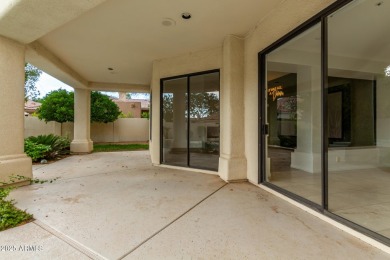 Tucked into a quiet cul-de-sac in the exclusive gated community on Gainey Ranch Golf Club in Arizona - for sale on GolfHomes.com, golf home, golf lot