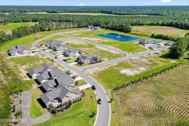 PARADE OF HOME MODEL!!! Beautiful Promenade Grande **Model on Ocean Ridge Plantation in North Carolina - for sale on GolfHomes.com, golf home, golf lot