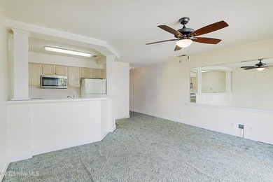 Opportunity knocks with this 1-bedroom condo in a gated golf on Brunswick Plantation and Golf Resorts in North Carolina - for sale on GolfHomes.com, golf home, golf lot