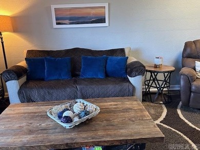 Enjoy lake life, free ATV/UTV trails, hiking, biking, tennis on Mountain Ranch Golf Club in Arkansas - for sale on GolfHomes.com, golf home, golf lot