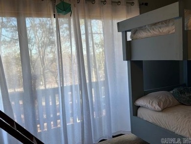 Enjoy lake life, free ATV/UTV trails, hiking, biking, tennis on Mountain Ranch Golf Club in Arkansas - for sale on GolfHomes.com, golf home, golf lot