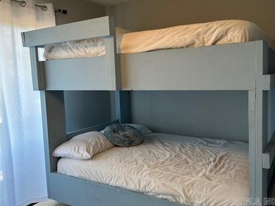 Enjoy lake life, free ATV/UTV trails, hiking, biking, tennis on Mountain Ranch Golf Club in Arkansas - for sale on GolfHomes.com, golf home, golf lot