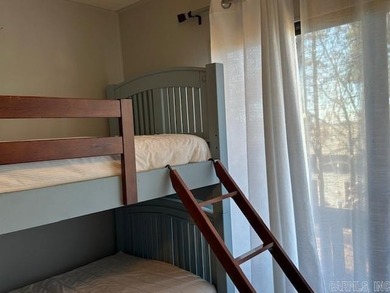 Enjoy lake life, free ATV/UTV trails, hiking, biking, tennis on Mountain Ranch Golf Club in Arkansas - for sale on GolfHomes.com, golf home, golf lot