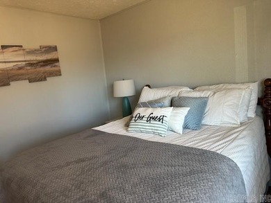 Enjoy lake life, free ATV/UTV trails, hiking, biking, tennis on Mountain Ranch Golf Club in Arkansas - for sale on GolfHomes.com, golf home, golf lot