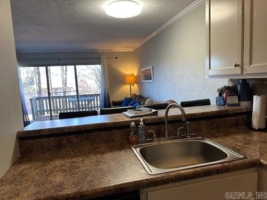 Enjoy lake life, free ATV/UTV trails, hiking, biking, tennis on Mountain Ranch Golf Club in Arkansas - for sale on GolfHomes.com, golf home, golf lot