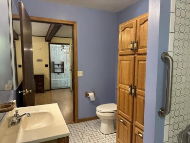 This well kept 2 bedroom is in a great location with paved road on Marquette Trails Country Club in Michigan - for sale on GolfHomes.com, golf home, golf lot