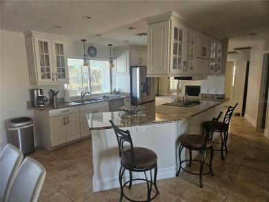 Welcome to your luxury waterfront oasis in Cape Coral! This on Royal Tee Country Club in Florida - for sale on GolfHomes.com, golf home, golf lot