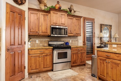 Gated courtyard leads you into a spacious, split floor plan on Bloomington Country Club in Utah - for sale on GolfHomes.com, golf home, golf lot