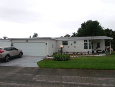 Beautiful 2 bedroom Palm Harbor Home with a double car garage on Schalamar Creek Golf and Country Club in Florida - for sale on GolfHomes.com, golf home, golf lot