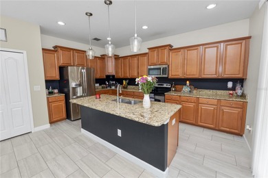 Welcome to resort-style living in this stunning golf course on Heritage Isles Golf and Country Club in Florida - for sale on GolfHomes.com, golf home, golf lot