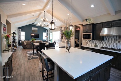 This stunning home has everything! Resort-style pool & spa plus on Verrado Golf Club - Victory in Arizona - for sale on GolfHomes.com, golf home, golf lot